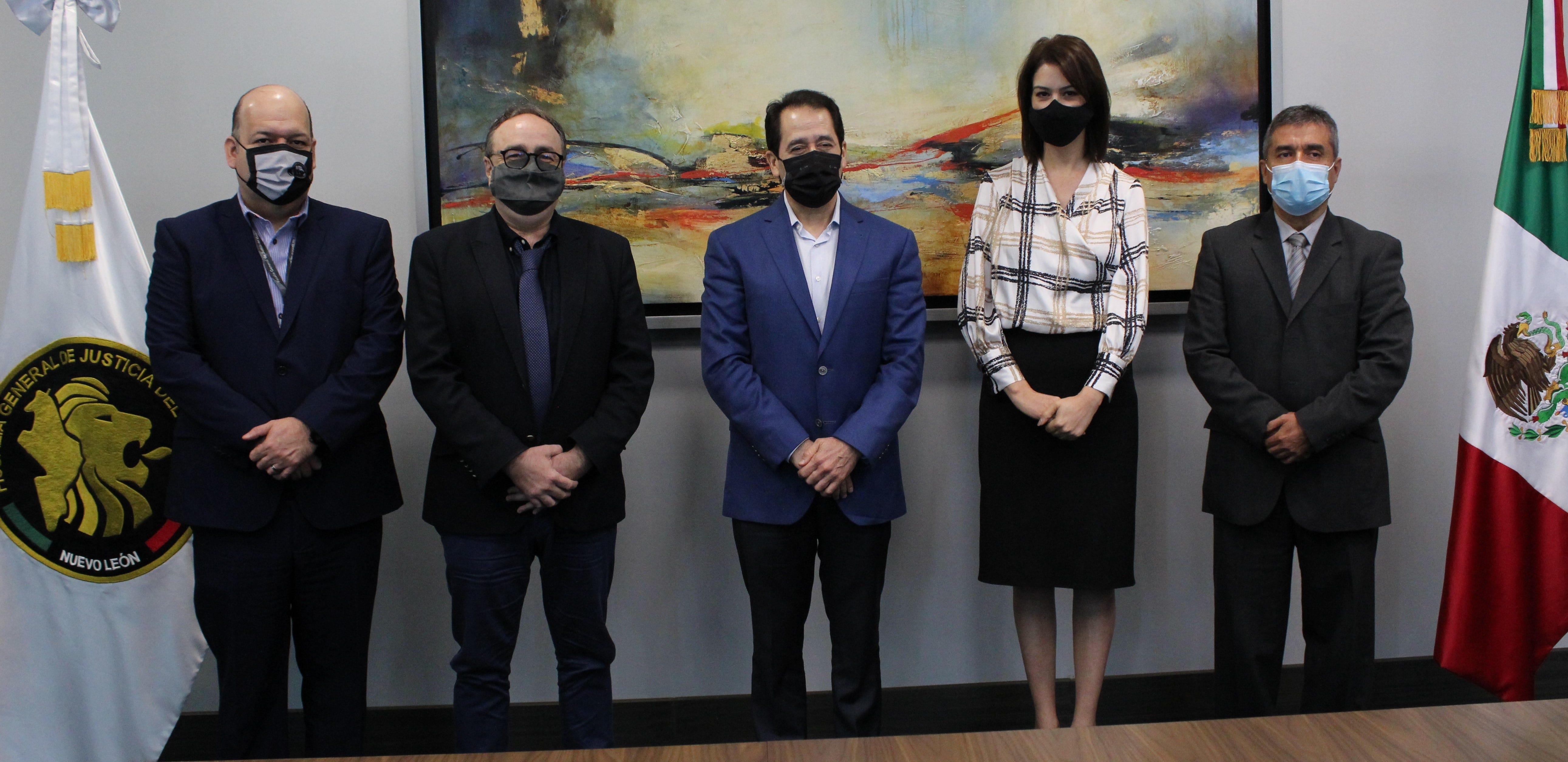 Representantes de la Fiscalía y de la UM.